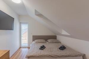 Posteľ alebo postele v izbe v ubytovaní Apartmán Černá v Pošumaví