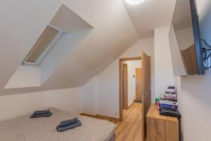Posteľ alebo postele v izbe v ubytovaní Apartmán Černá v Pošumaví