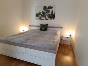 Postel nebo postele na pokoji v ubytování Apartments Nassfeldpass