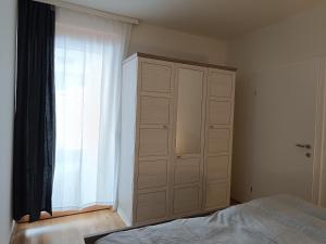 Postel nebo postele na pokoji v ubytování Apartments Nassfeldpass