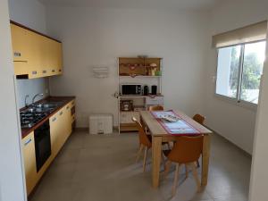 Η κουζίνα ή μικρή κουζίνα στο Appartamento Alessia +18 φωτογραφίες