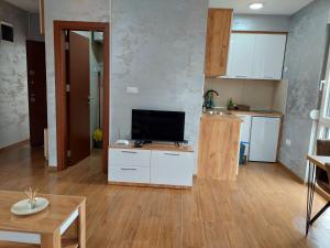 O bucătărie sau chicinetă la Apartmani DIVČI TRON 12 +5 fotografii
