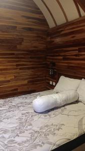 Ένα ή περισσότερα κρεβάτια σε δωμάτιο στο Jatisela Bungalow