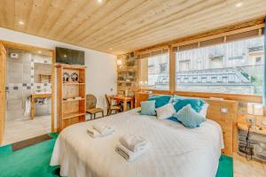 Postel nebo postele na pokoji v ubytování Chalet Monte Bianco