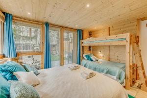 Postel nebo postele na pokoji v ubytování Chalet Monte Bianco