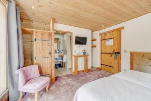 TV a/nebo společenská místnost v ubytování Chalet Monte Bianco