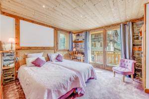 Postel nebo postele na pokoji v ubytování Chalet Monte Bianco