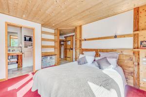 Postel nebo postele na pokoji v ubytování Chalet Monte Bianco
