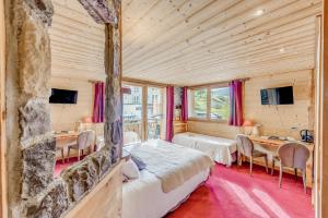 Postel nebo postele na pokoji v ubytování Chalet Monte Bianco