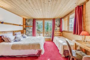 Postel nebo postele na pokoji v ubytování Chalet Monte Bianco