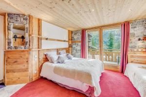 Postel nebo postele na pokoji v ubytování Chalet Monte Bianco
