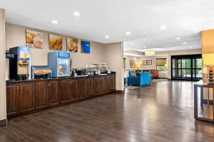 a lobby of a hospital with a food counter at Comfort Inn Clinton in Clinton