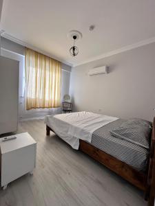 a bedroom with a large bed and a window at Lavender Villas in Dalaman +50 photos