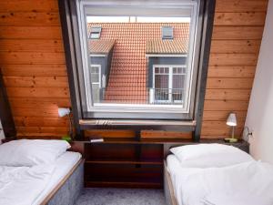 Ein Bett oder Betten in einem Zimmer der Unterkunft Holiday Home Koralle-1 by Interhome
