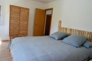 Postel nebo postele na pokoji v ubytování Cainés