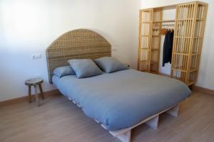 Postel nebo postele na pokoji v ubytování Cainés