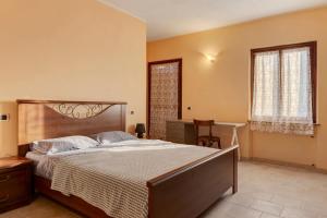 Postel nebo postele na pokoji v ubytování Tenuta Paradiso + 37 fotografií