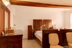 Postel nebo postele na pokoji v ubytování Tenuta Paradiso