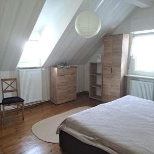 Postel nebo postele na pokoji v ubytování Ferienwohnung An der Weser