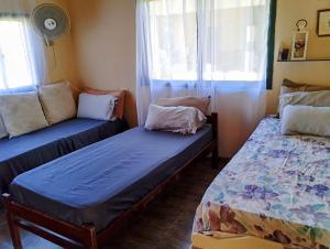 Ένα ή περισσότερα κρεβάτια σε δωμάτιο στο Cabaña viejos Campos de Alvarez +14 φωτογραφίες