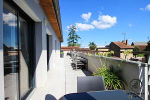 Balkón nebo terasa v ubytování Urban Jungle Appart Terrasse Clim Parking