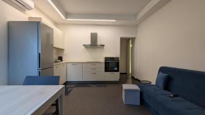 Kuchyň nebo kuchyňský kout v ubytování Catullo Apartment 10 minutes from airport + 4 fotografie