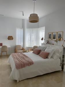 Posteľ alebo postele v izbe v ubytovaní Apartamento Hoyo 20 de La Monacilla Golf