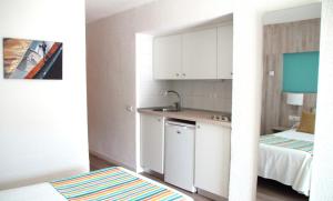 A kitchen or kitchenette at HOVIMA Panorama