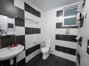 Fotografie z fotogalerie ubytování Cozy FamiLee Homestay v destinaci Simpang Ampat