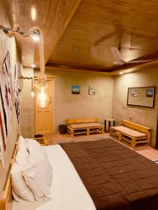 Postel nebo postele na pokoji v ubytování Orgventure Resorts Skardu