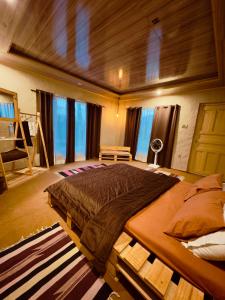 Postel nebo postele na pokoji v ubytování Orgventure Resorts Skardu