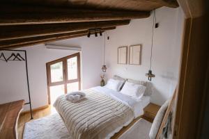 a bedroom with a large bed in a room at Cloud9 Chalet in Arachova