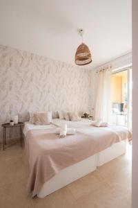 Łóżko lub łóżka w pokoju w obiekcie Aquamarine apartment in Marina Sotogrande