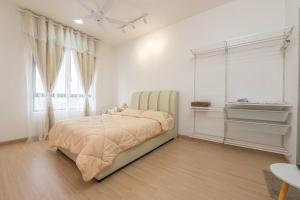 a white bedroom with a bed and a window at Cheras Kuala Lumpur luxury condo in Cheras +51 photos