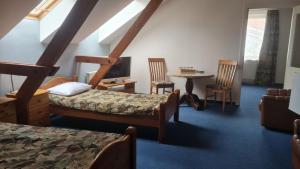 Postel nebo postele na pokoji v ubytování Hotel Tukums + 37 fotografií