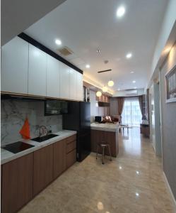 Η κουζίνα ή μικρή κουζίνα στο Comfy and lux 1br Podomoro