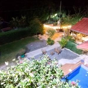an aerial view of a backyard at night at Jarabacoa - Alma Verde Eco Stay - Estancia La Esperanza in Jarabacoa