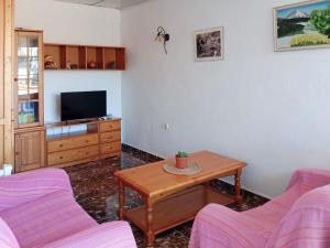 TV a/nebo společenská místnost v ubytování Live la Victoria Carril - Casa acogedora y familiar con terraza completa