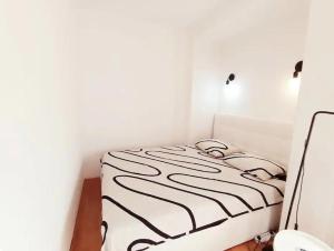 Ein Bett oder Betten in einem Zimmer der Unterkunft Beautiful Apartment, Close to Beach