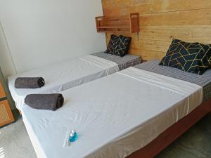 Anggie Homestay客房内的一张或多张床位