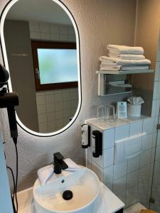 Koupelna v ubytování Lint Hotel Köln + 29 fotografií