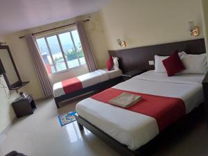 Gulta vai gultas numurā naktsmītnē Hotel My Dream