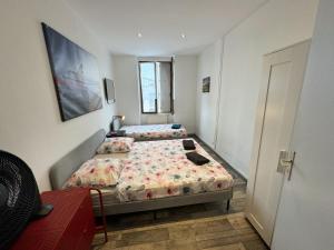 Ένα ή περισσότερα κρεβάτια σε δωμάτιο στο 012 CHIC & COSY F2 34m2 HYPERCENTRE WIFI SMART TV NETFLIX +18 φωτογραφίες