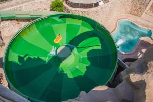 an overhead view of a slide at a water park at Reef Oasis Beach Aqua Park Resort in Sharm El Sheikh