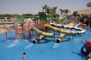 a water park with a bunch of water slides at Reef Oasis Beach Aqua Park Resort in Sharm El Sheikh