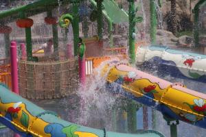 a water slide at a playground in the rain at Reef Oasis Beach Aqua Park Resort in Sharm El Sheikh