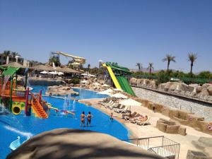 a water park with a water slide and slides at Reef Oasis Beach Aqua Park Resort in Sharm El Sheikh
