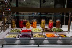 a display of different types of vegetables in containers at Reef Oasis Beach Aqua Park Resort in Sharm El Sheikh