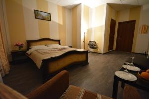 
Кровать или кровати в номере Отель Карат
