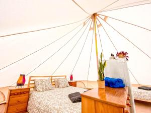 Ένα ή περισσότερα κρεβάτια σε δωμάτιο στο Quinta Glamping